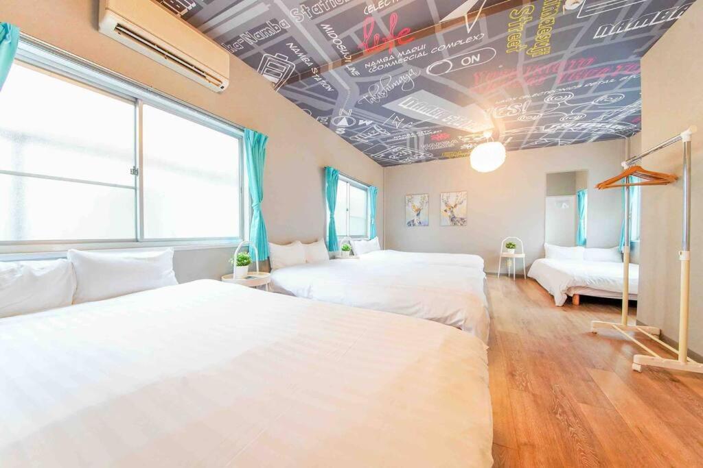 Sanacion Namba 難波千日前の5Ldk120平米 駅徒歩2分 広々バルコニーでバーベキューも可能 Appartement Osaka Buitenkant foto