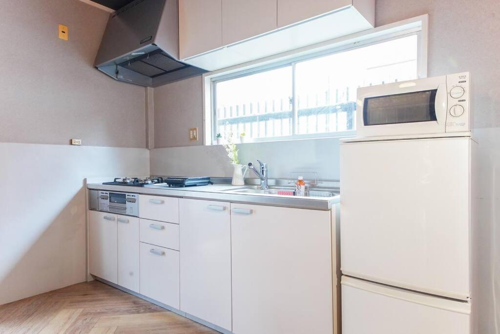 Sanacion Namba 難波千日前の5Ldk120平米 駅徒歩2分 広々バルコニーでバーベキューも可能 Appartement Osaka Buitenkant foto