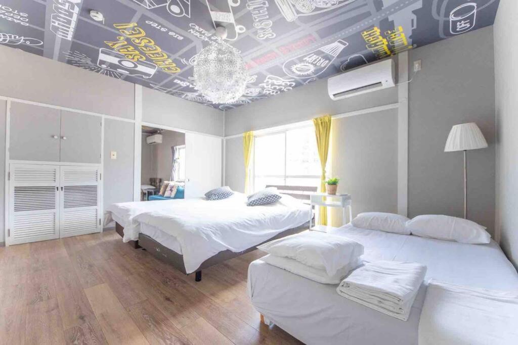 Sanacion Namba 難波千日前の5Ldk120平米 駅徒歩2分 広々バルコニーでバーベキューも可能 Appartement Osaka Buitenkant foto