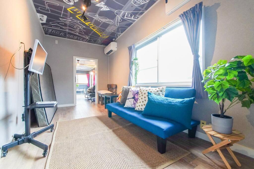 Sanacion Namba 難波千日前の5Ldk120平米 駅徒歩2分 広々バルコニーでバーベキューも可能 Appartement Osaka Buitenkant foto