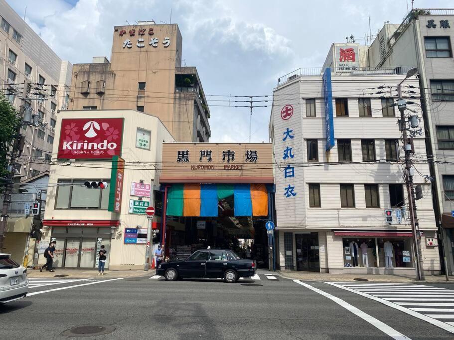 Sanacion Namba 難波千日前の5Ldk120平米 駅徒歩2分 広々バルコニーでバーベキューも可能 Appartement Osaka Buitenkant foto