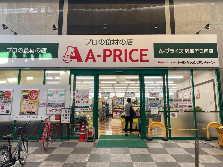 Sanacion Namba 難波千日前の5Ldk120平米 駅徒歩2分 広々バルコニーでバーベキューも可能 Appartement Osaka Buitenkant foto