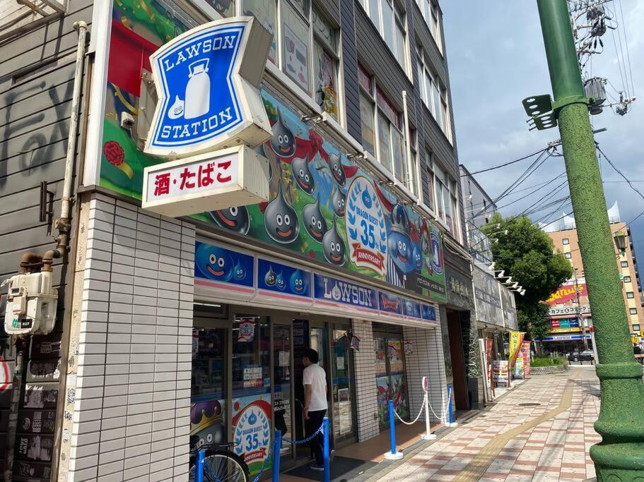 Sanacion Namba 難波千日前の5Ldk120平米 駅徒歩2分 広々バルコニーでバーベキューも可能 Appartement Osaka Buitenkant foto