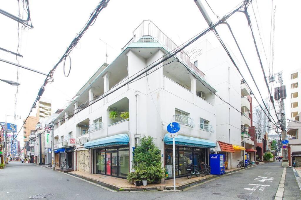 Sanacion Namba 難波千日前の5Ldk120平米 駅徒歩2分 広々バルコニーでバーベキューも可能 Appartement Osaka Buitenkant foto
